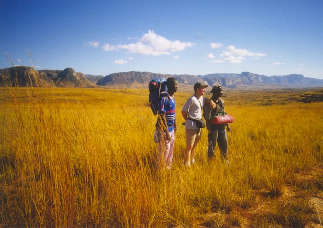 Josy (in blue shirt) and Jamie on their travels, February 2001